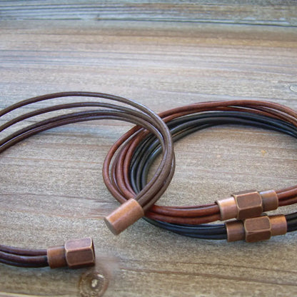 Thin strand bracelet with copper toned brass magnetic clasp